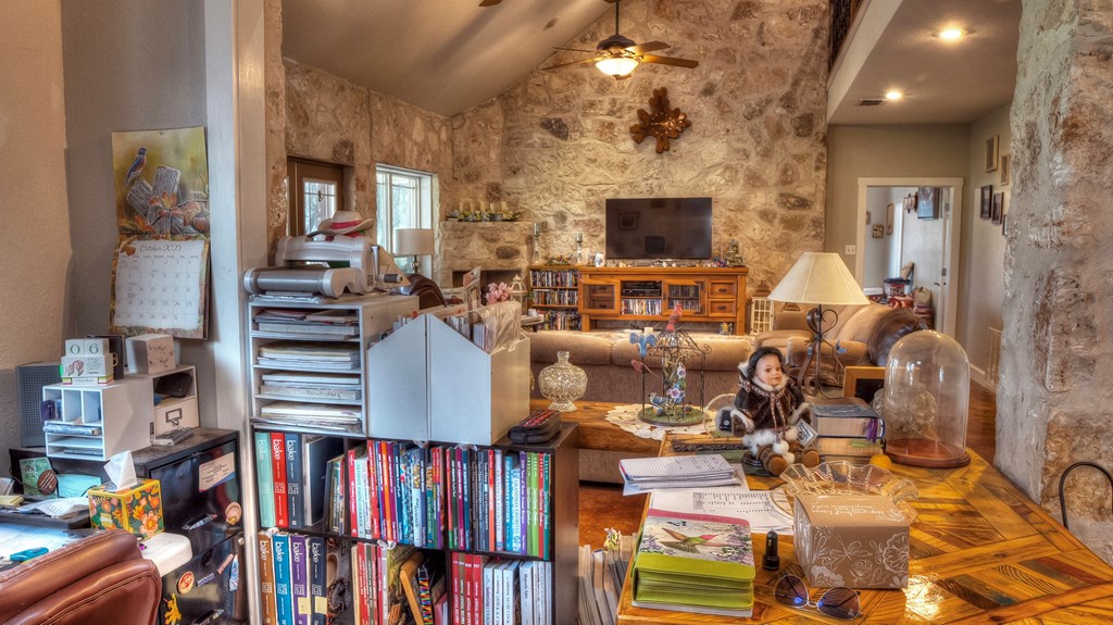 4573 Ranch Road 1120 Rio Frio, TX 78879 - Photo 27 of 71 a living room with lots of furniture and a flat screen tv