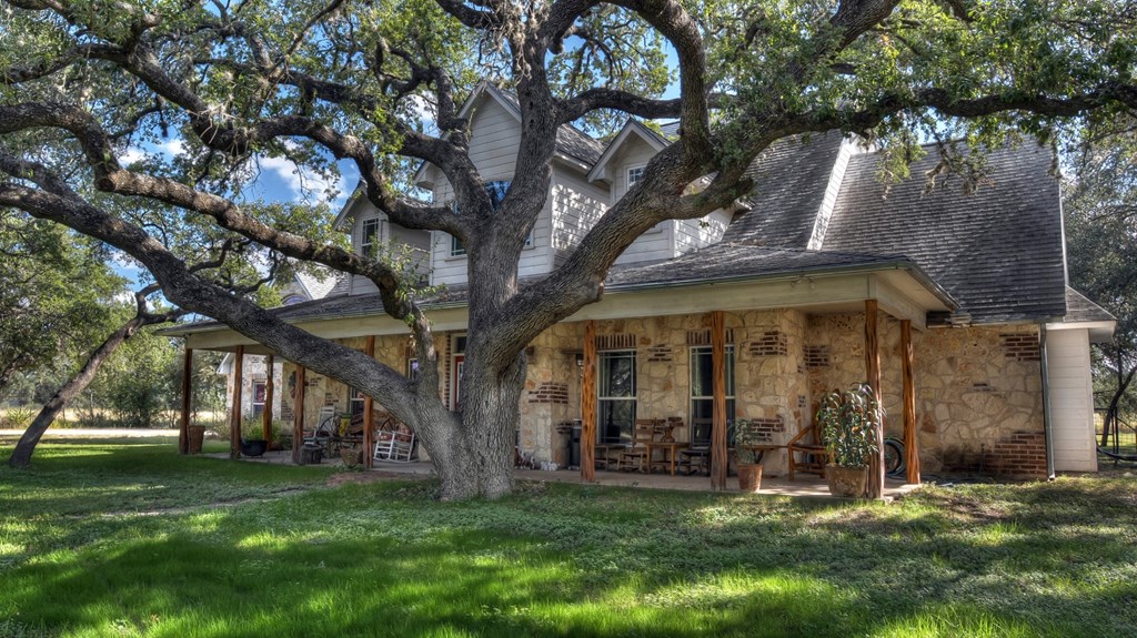 4573 Ranch Road 1120 Rio Frio, TX 78879 - Photo 3 of 71 a view of a building with a yard