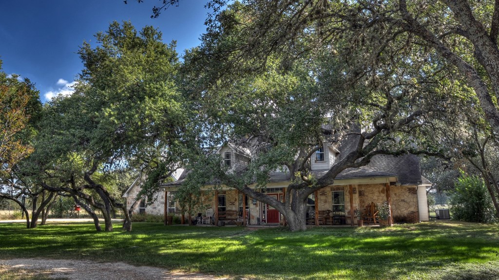 4573 Ranch Road 1120 Rio Frio, TX 78879 - Photo 4 of 71 front view of house with a garden