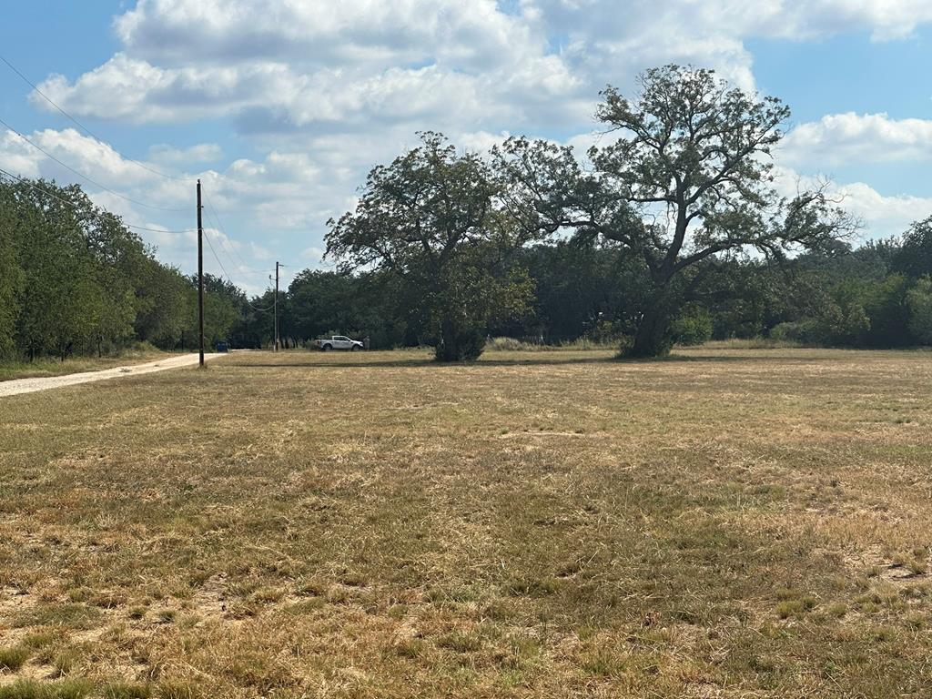 4573 Ranch Road 1120 Rio Frio, TX 78879 - Photo 66 of 70 a view of outdoor space with swimming pool and trees in the background