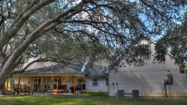 a view of a yard in front of the house
