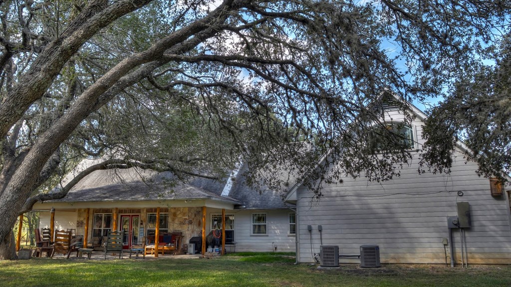 4573 Ranch Road 1120 Rio Frio, TX 78879 - Photo 10 of 71 a view of a large building with large trees
