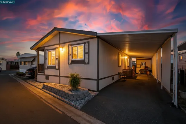 a view of a house with a street