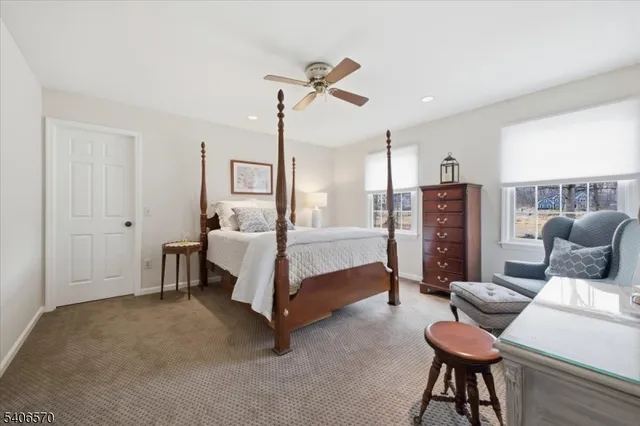 a bedroom with furniture and a bed