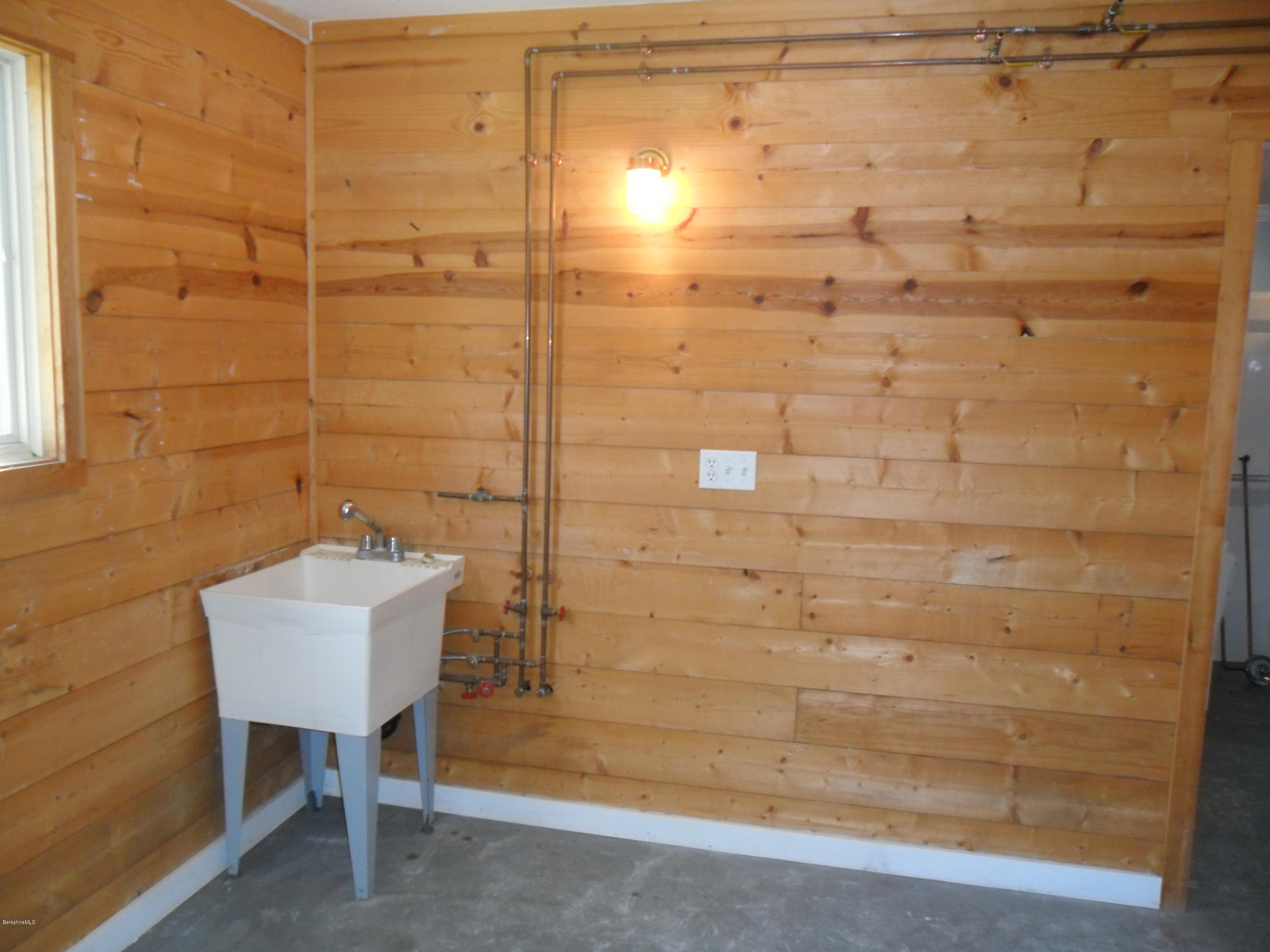 107 State Line Road West Stockbridge, MA 01266 - Photo 50 of 52 a bathroom with a shower and a sink