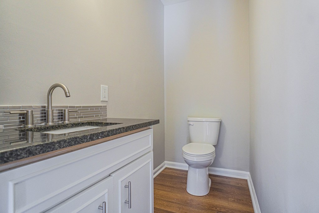 6221 Charing Drive Columbus, GA 31909 - Photo 14 of 18 a bathroom with a toilet and a sink