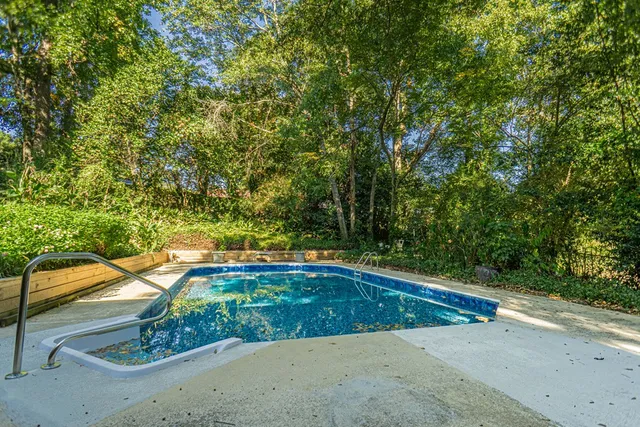 a view of a swimming pool with an outdoor space