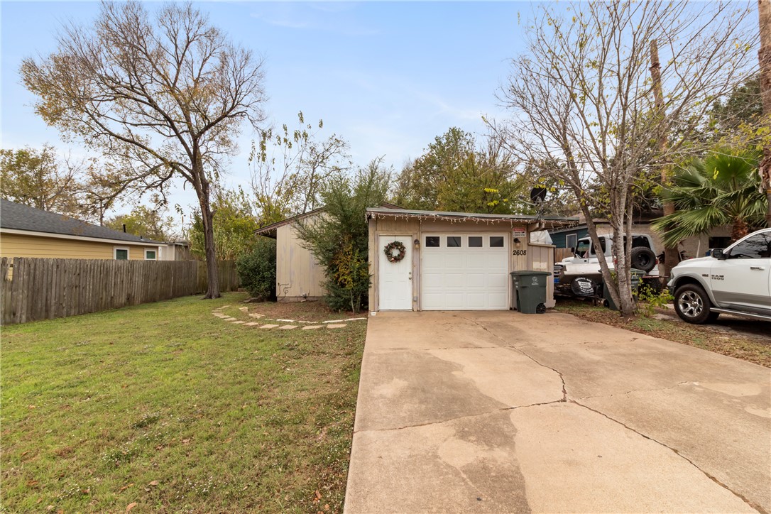 2608 Cavitt Avenue Bryan, TX 77801 - Photo 1 of 1 a view of a house with a yard and garage