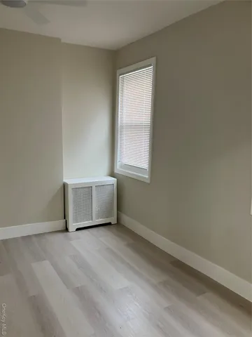 a kitchen with a refrigerator and a sink