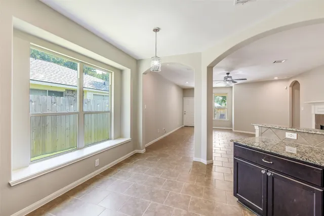 a view of a kitchen cabinets and living room