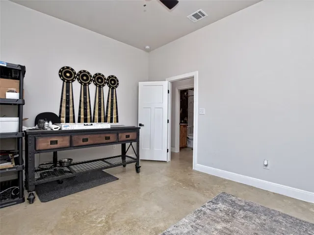 a view of room with gym equipment