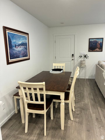 673 West 1920 South, Unit 1063 Provo, UT 84601 - Photo 7 of 15 Dining area featuring wood-finish flooring, white walls, and a recessed ceiling light