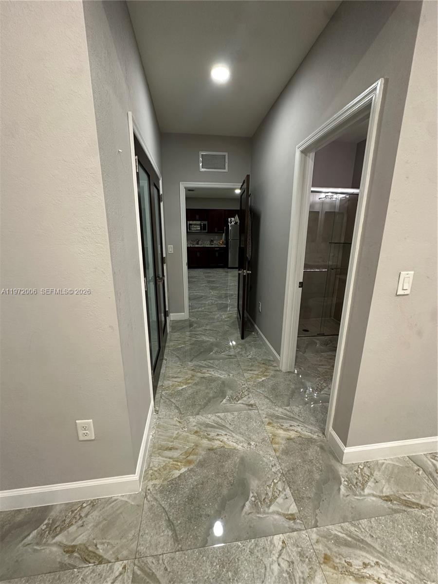 11711 Southwest 251st Street, Unit 1 Homestead, FL 33032 - Photo 1 of 14