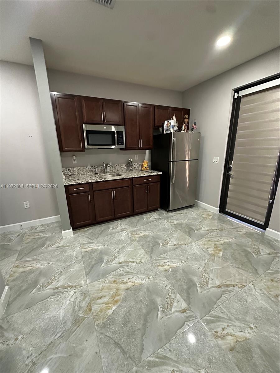 11711 Southwest 251st Street, Unit 1 Homestead, FL 33032 - Photo 5 of 14