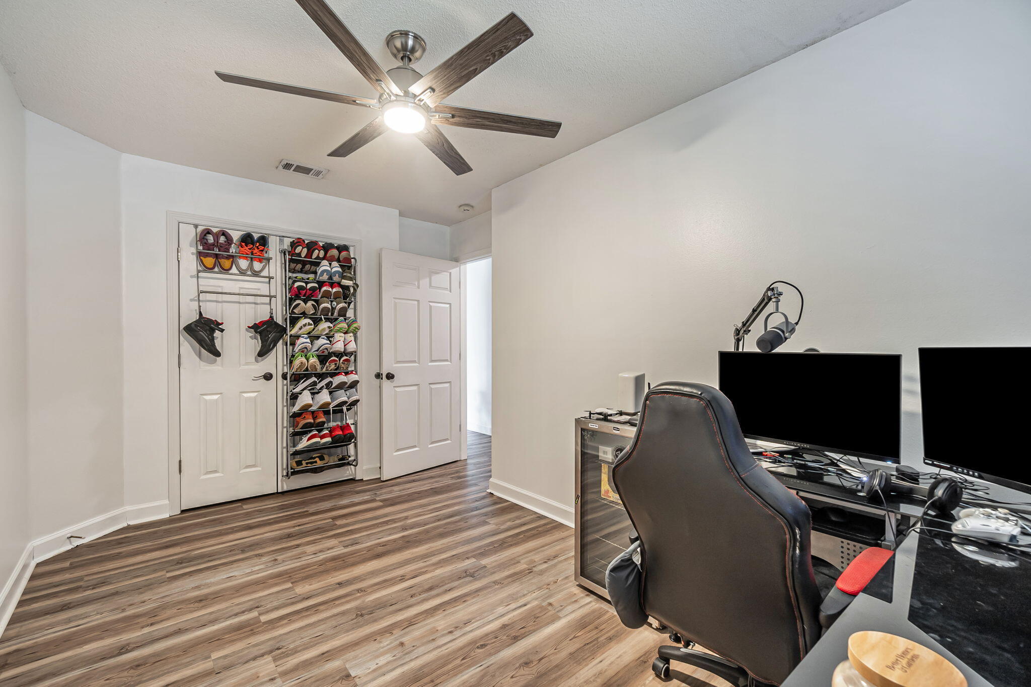 5154 Rosebud Avenue Crestview, FL 32539 - Photo 13 of 24 a view of a workspace with furniture and gym equipment