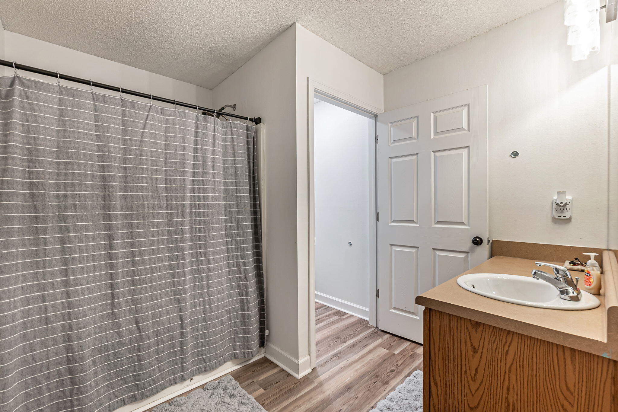 5154 Rosebud Avenue Crestview, FL 32539 - Photo 19 of 24 a bathroom with a sink a toilet and shower