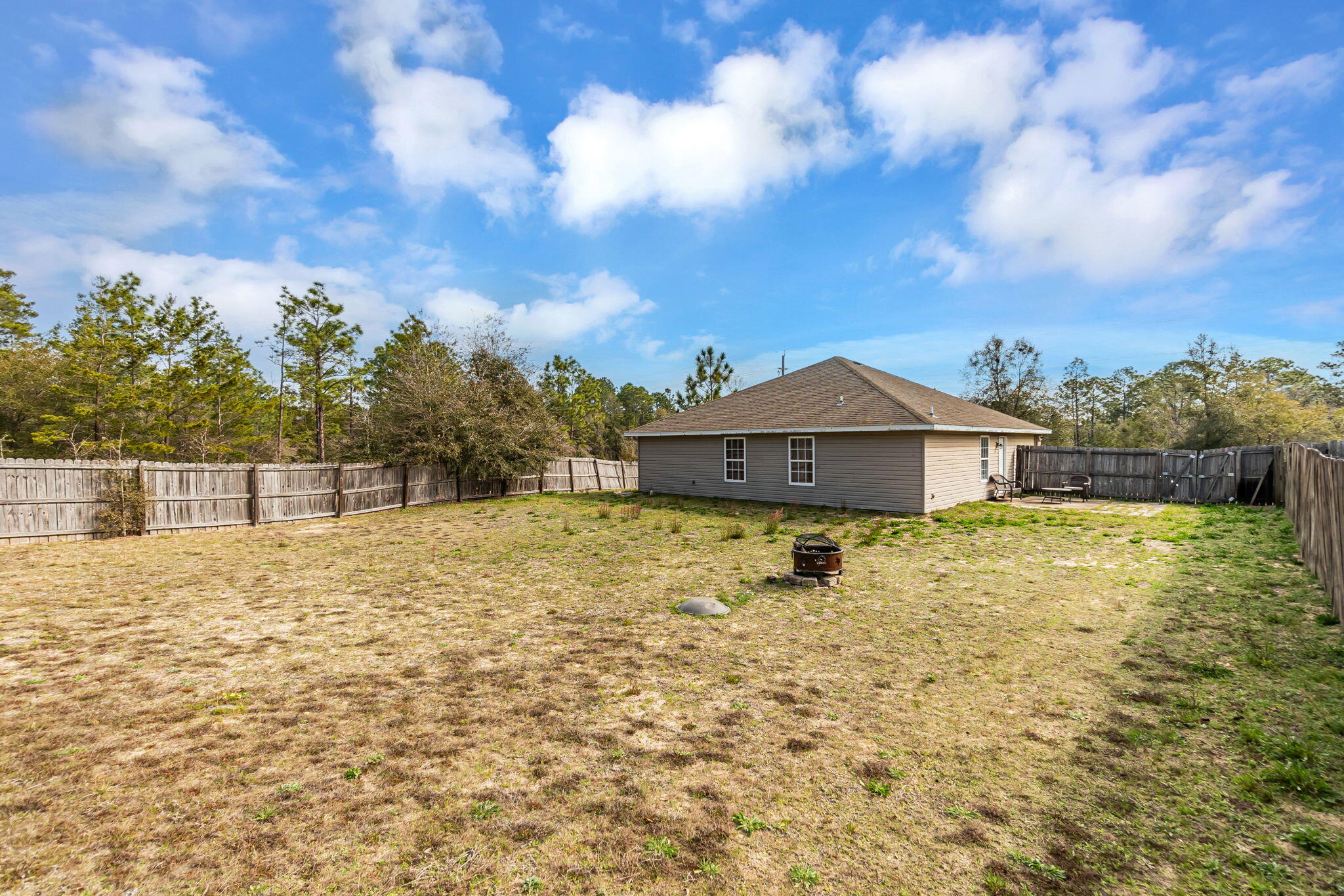 5154 Rosebud Avenue Crestview, FL 32539 - Photo 22 of 24 a bathroom with a sink and a yard