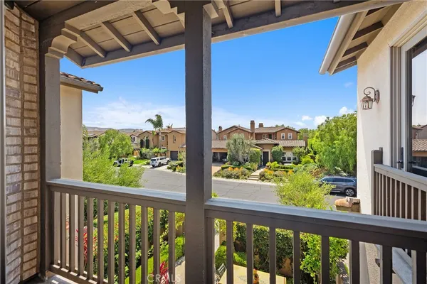 a view of a balcony with a potted plant