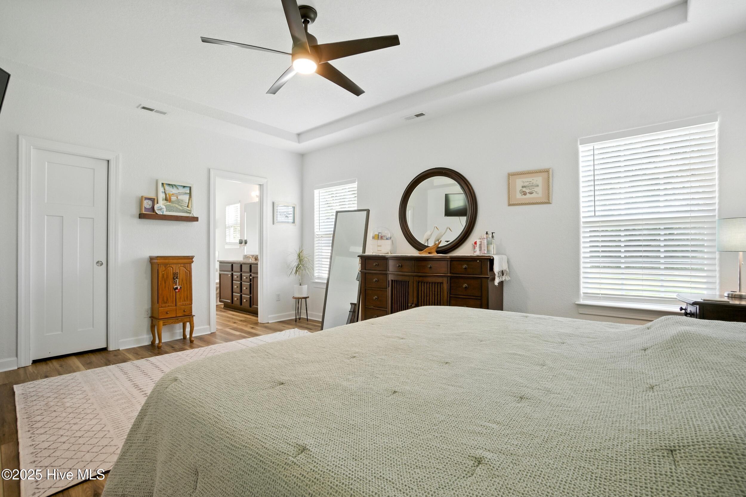 100 Rosedale Court Moyock, NC 27958 - Photo 23 of 50 Primary Bedroom with tray ceiling