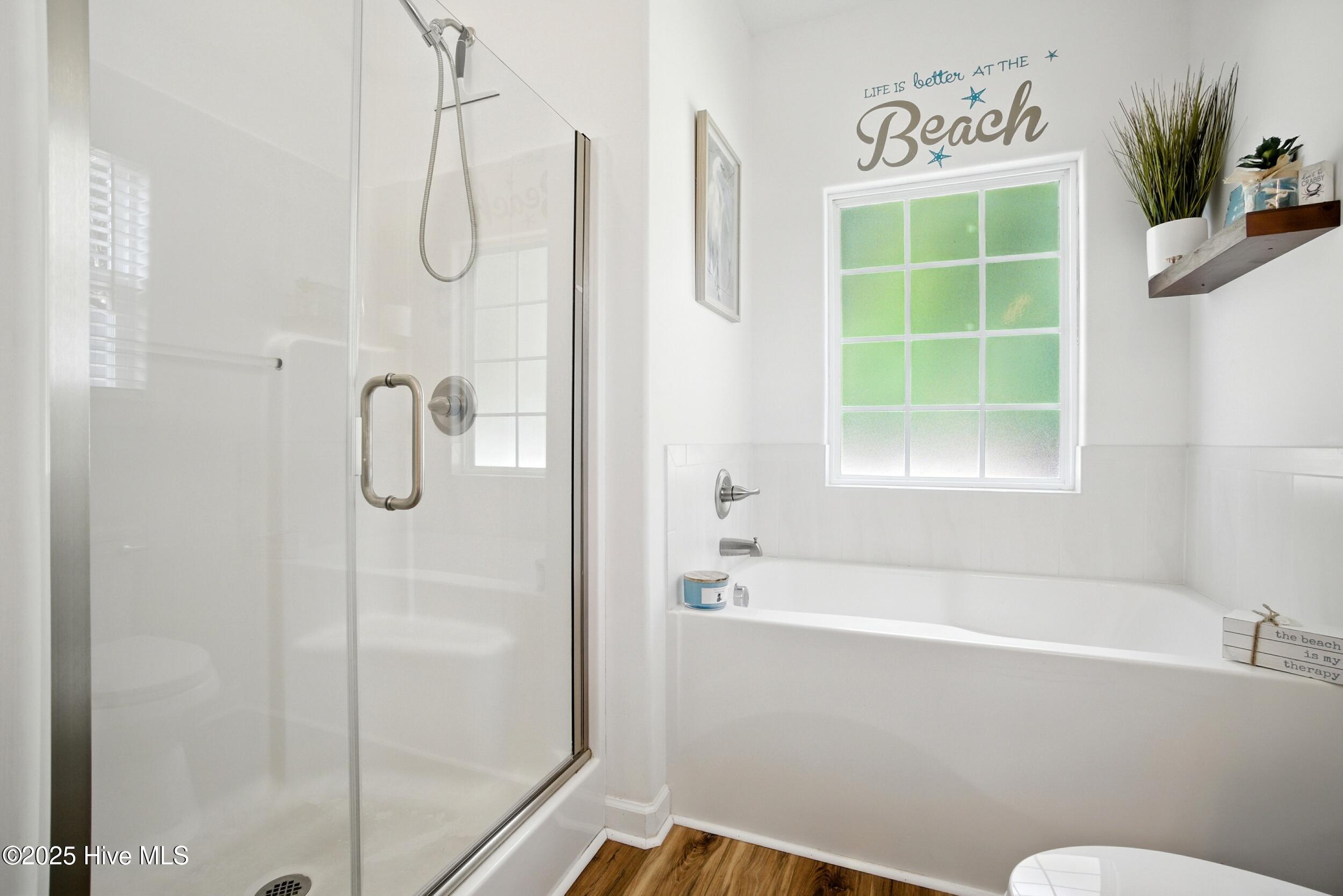 100 Rosedale Court Moyock, NC 27958 - Photo 27 of 50 Primary en-suite bath with soaker tub and separate shower