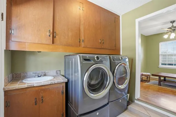 a utility room with dryer and washer