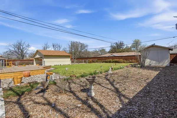 a view of a yard with an outdoor space