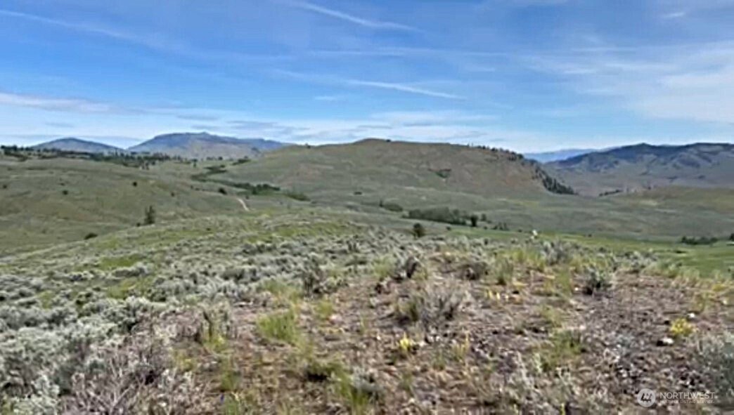 a view of mountain with sunset view