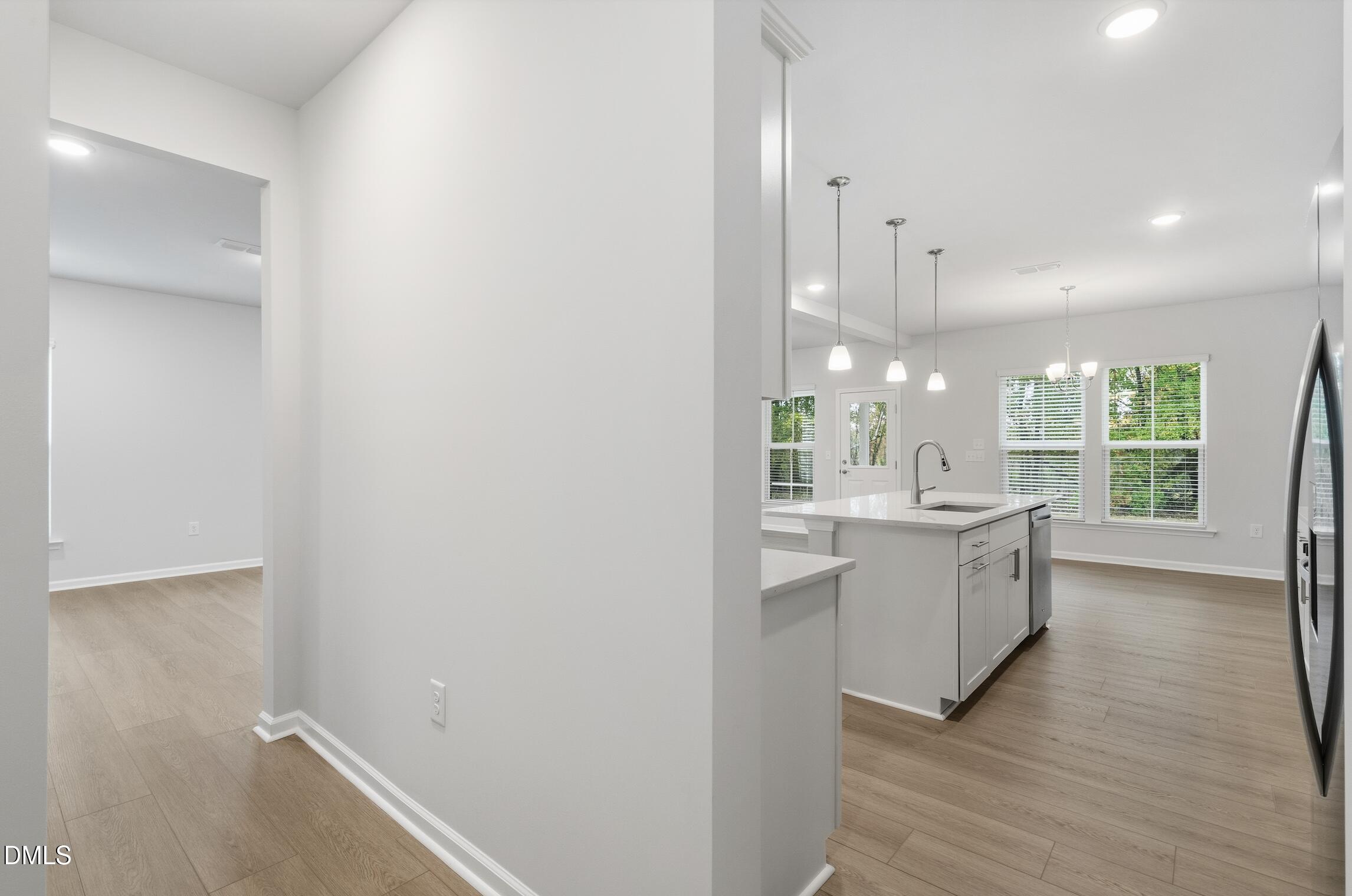 505 Providence Springs Lane Fuquay-Varina, NC 27526 - Photo 17 of 40 a large bathroom with a sink a large mirror and a shower