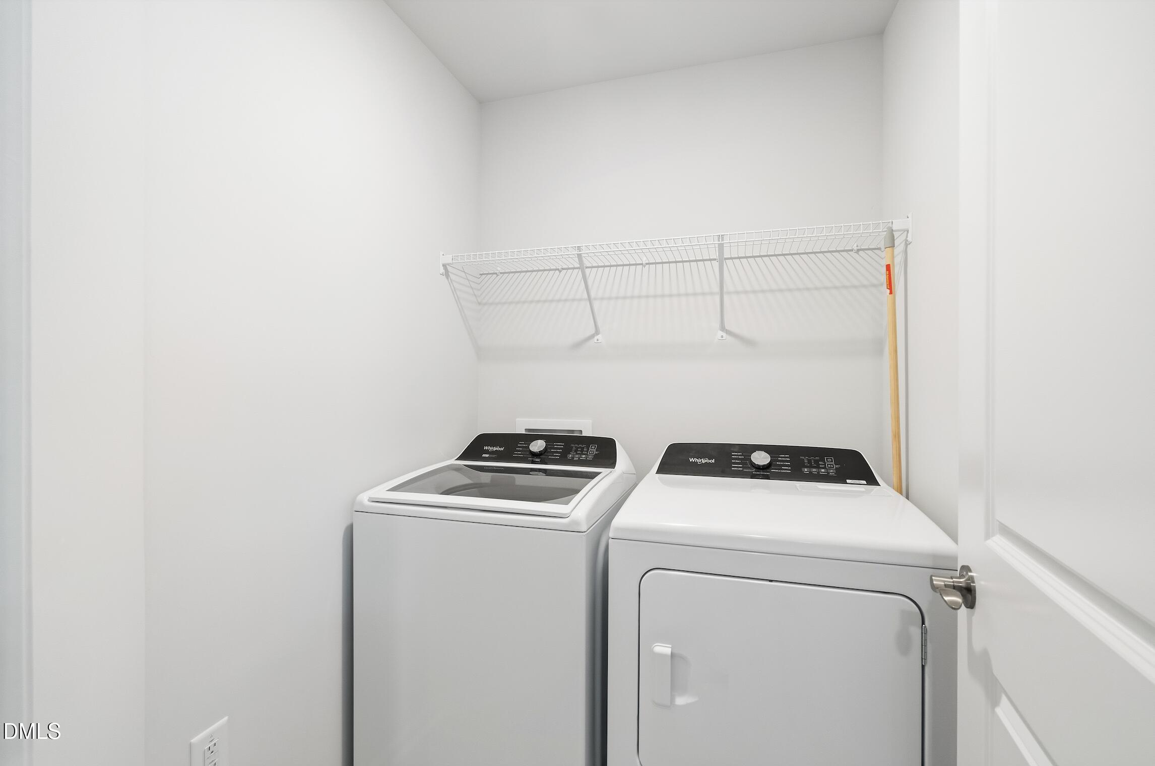 505 Providence Springs Lane Fuquay-Varina, NC 27526 - Photo 22 of 40 a utility room with dryer and washer