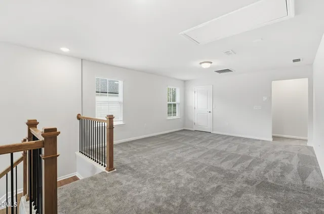 a view of a livingroom with a staircase