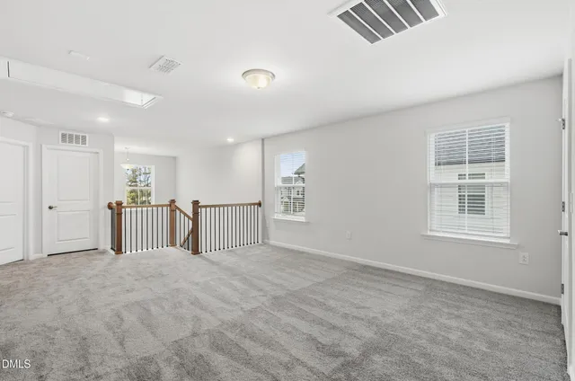a view of a livingroom with furniture and window