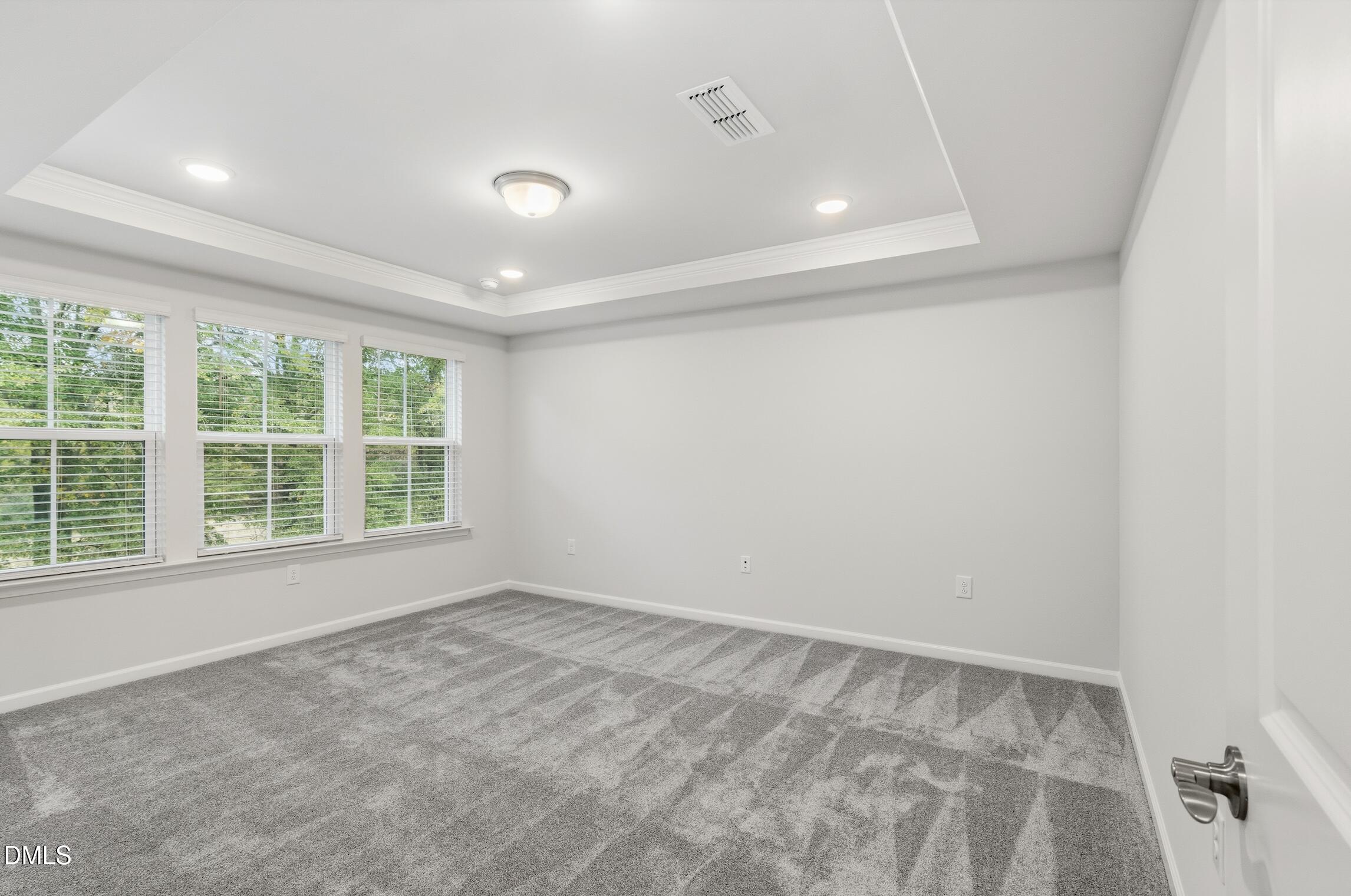 505 Providence Springs Lane Fuquay-Varina, NC 27526 - Photo 28 of 40 an empty room with a window