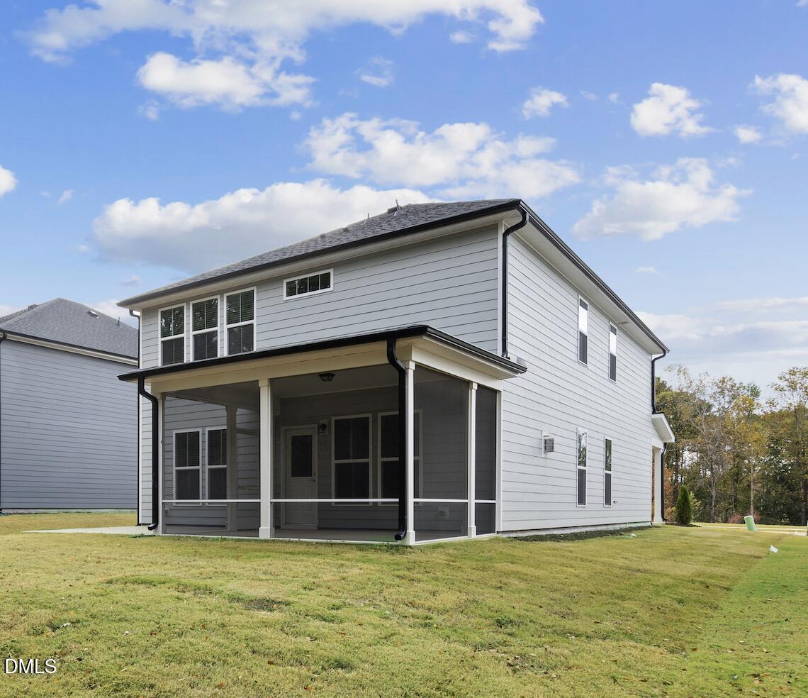 505 Providence Springs Lane Fuquay-Varina, NC 27526 - Photo 37 of 40 a view of a house with a yard
