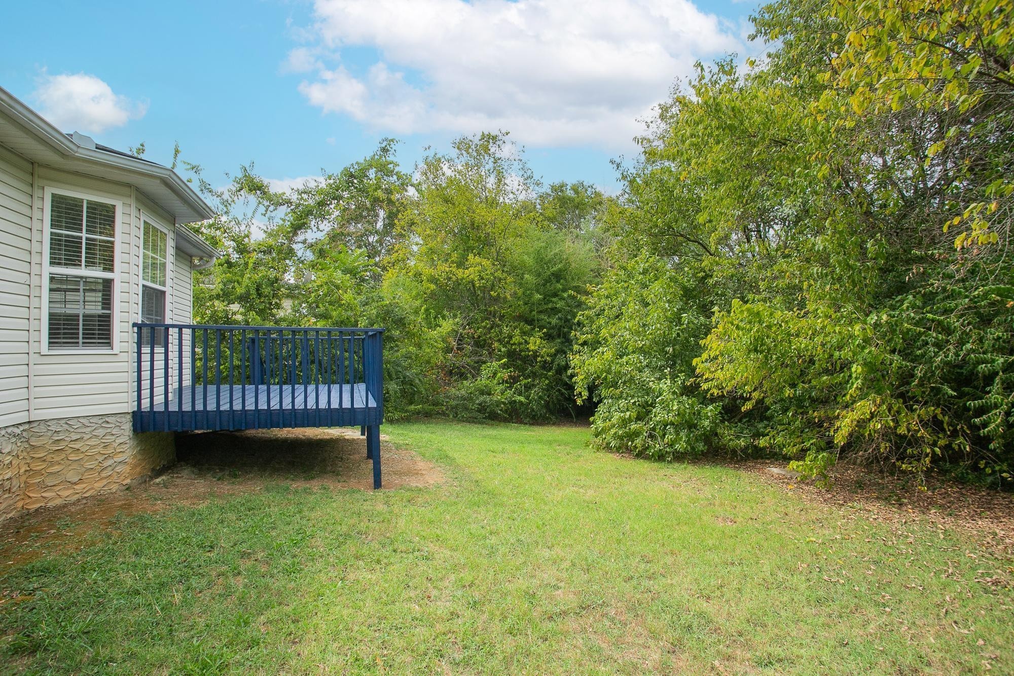 517 Longleaf Court Nashville, TN 37207 - Photo 39 of 41 a view of a chair in a patio next to a yard