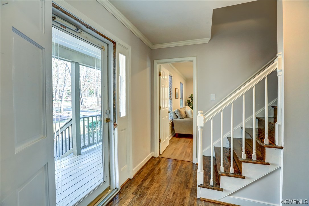 3612 Stoney Ridge Trail Midlothian, VA 23112 - Photo 5 of 49 a view of hallway with wooden floor and staircase