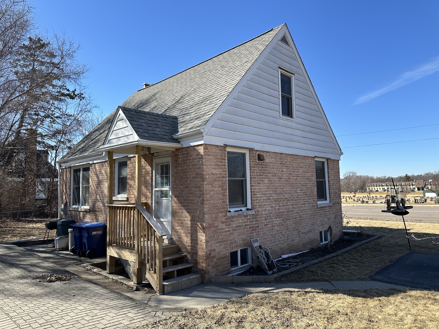542 Sycamore Road DeKalb, IL 60115 - Photo 2 of 17 a front view of a house with a yard