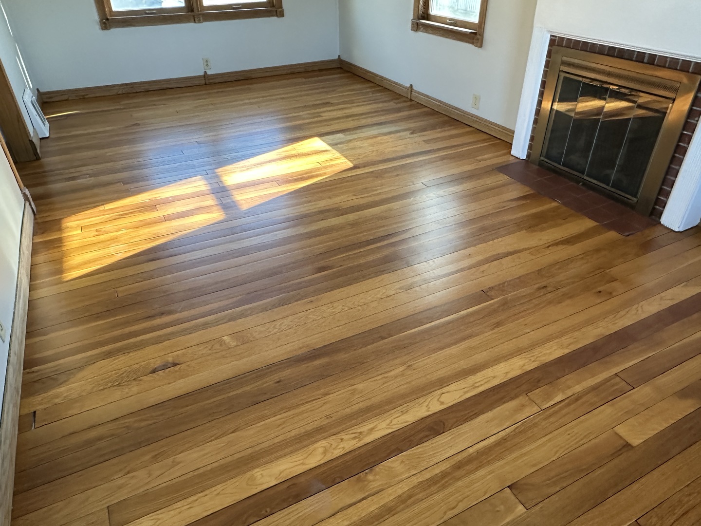542 Sycamore Road DeKalb, IL 60115 - Photo 5 of 17 a view of empty room with wooden floor