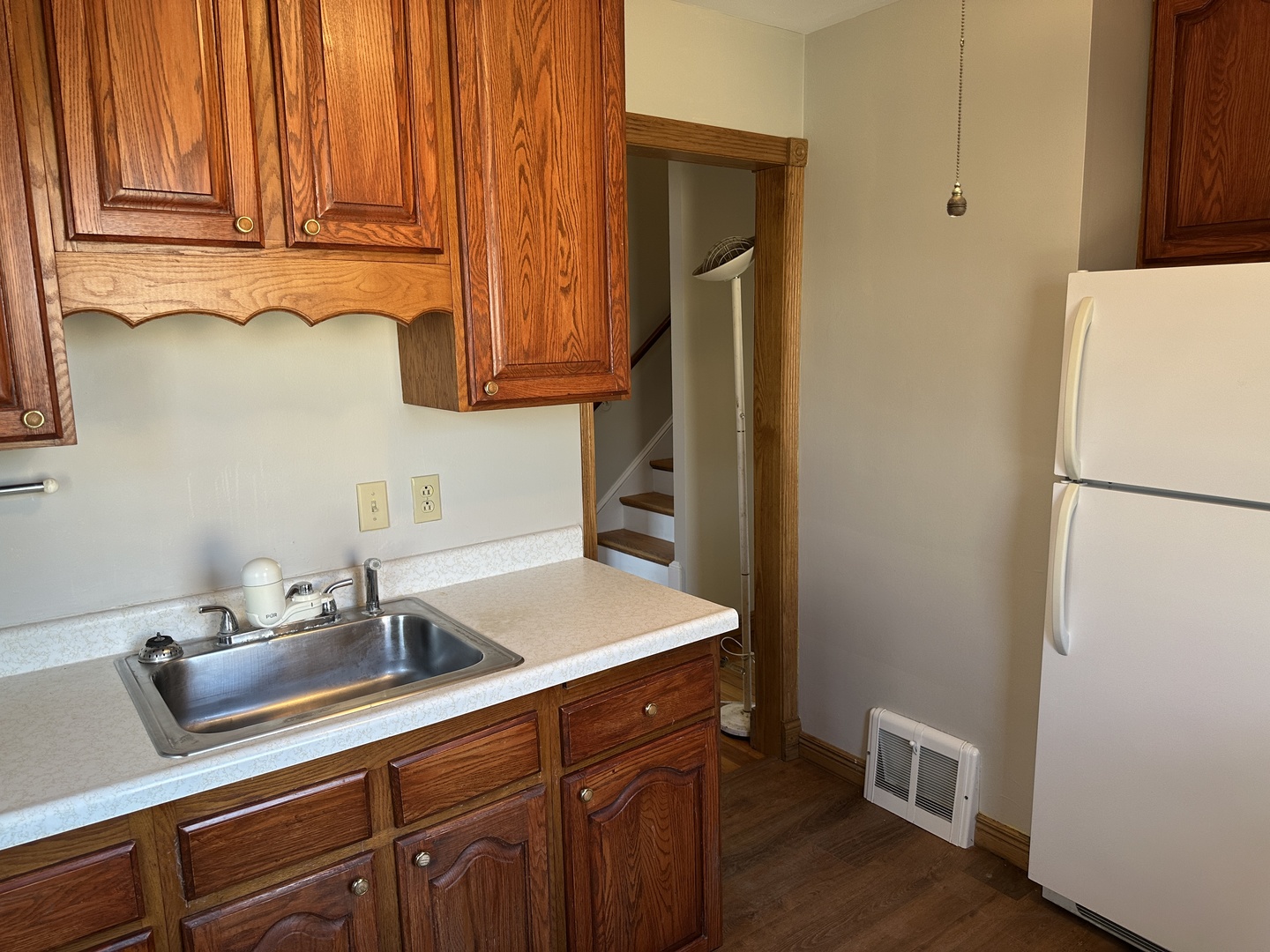 542 Sycamore Road DeKalb, IL 60115 - Photo 9 of 17 a kitchen with a sink cabinets and appliances