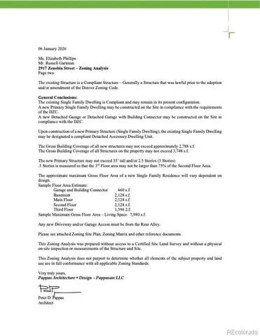 a view of patio with a table and chairs under an umbrella