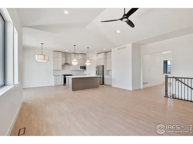 a view of kitchen with wooden floor