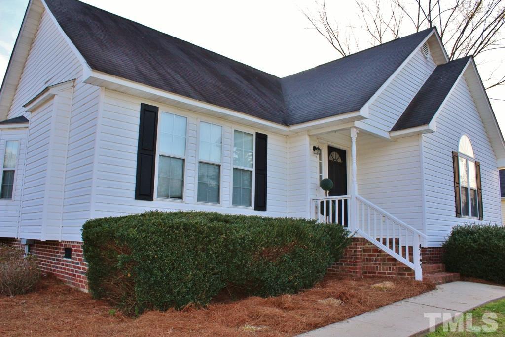 9861 Old Middlesex Road Middlesex, NC 27557 - Photo 2 of 10 a front view of a house with a yard