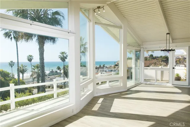 a front view of a house with a porch