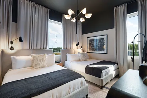 a bathroom with a toilet and a vanity