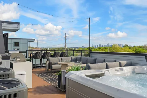 a view of swimming pool with outdoor seating
