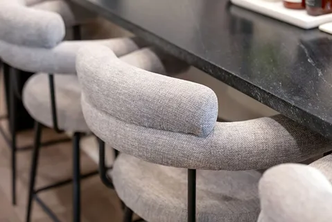 a stove top oven sitting inside of a kitchen
