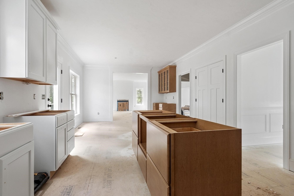 37 Dogwood Road Littleton, MA 01460 - Photo 10 of 36 a kitchen that has a sink and a stove in it