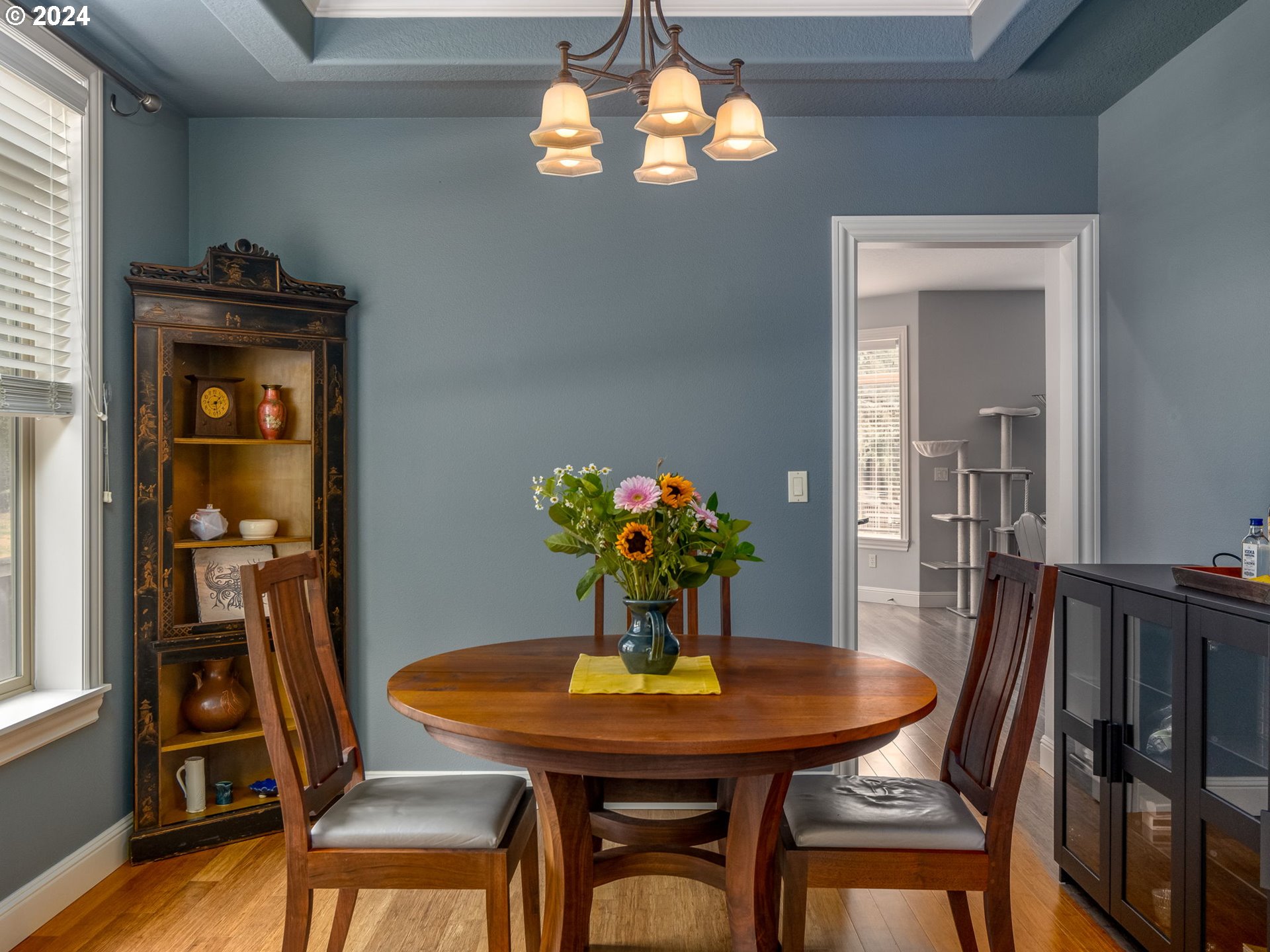 5316 Lower Drive Lake Oswego, OR 97035 - Photo 11 of 25 a view of a dining room with furniture and wooden floor