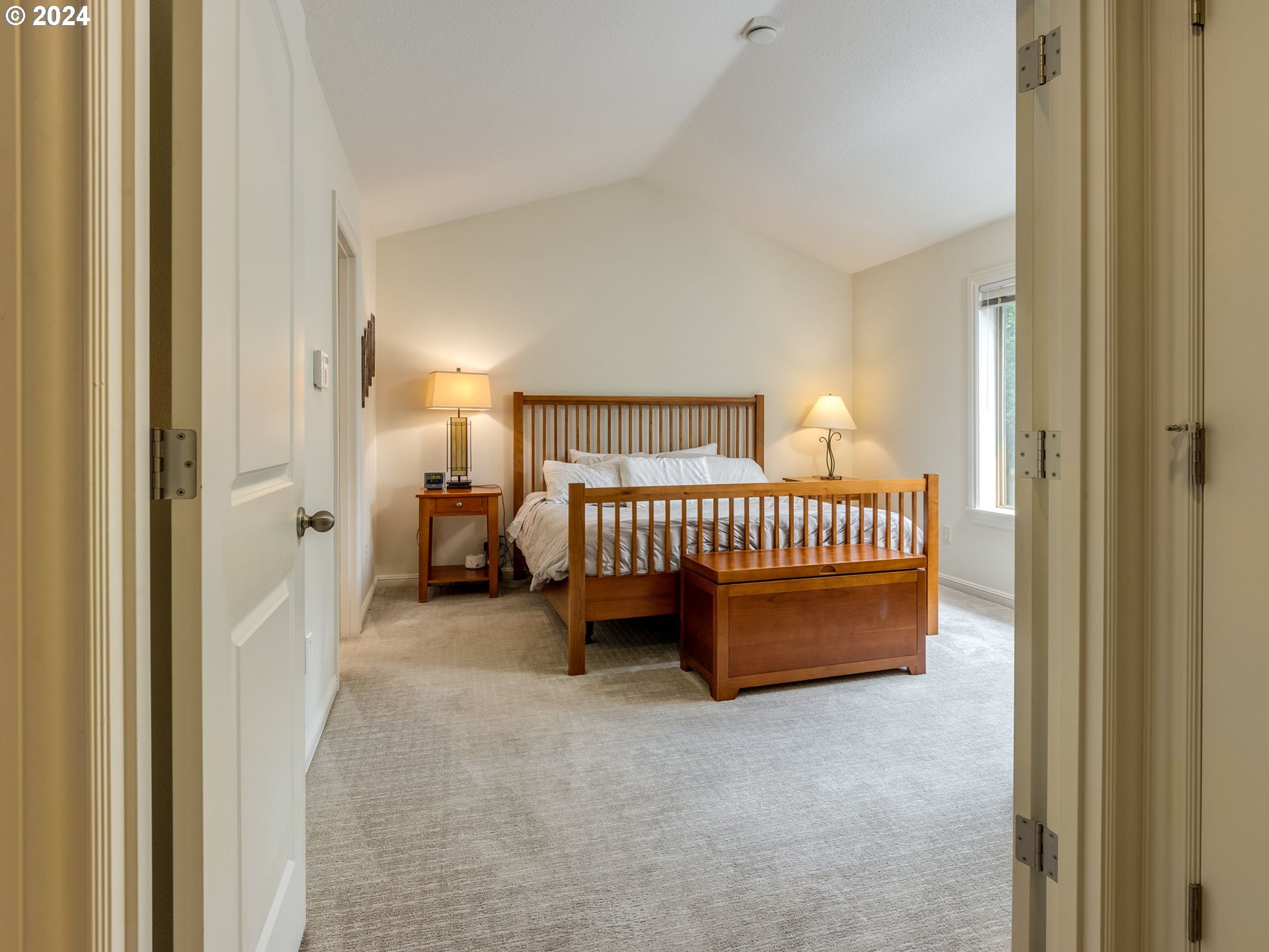 5316 Lower Drive Lake Oswego, OR 97035 - Photo 14 of 25 a bedroom with a bed and a table