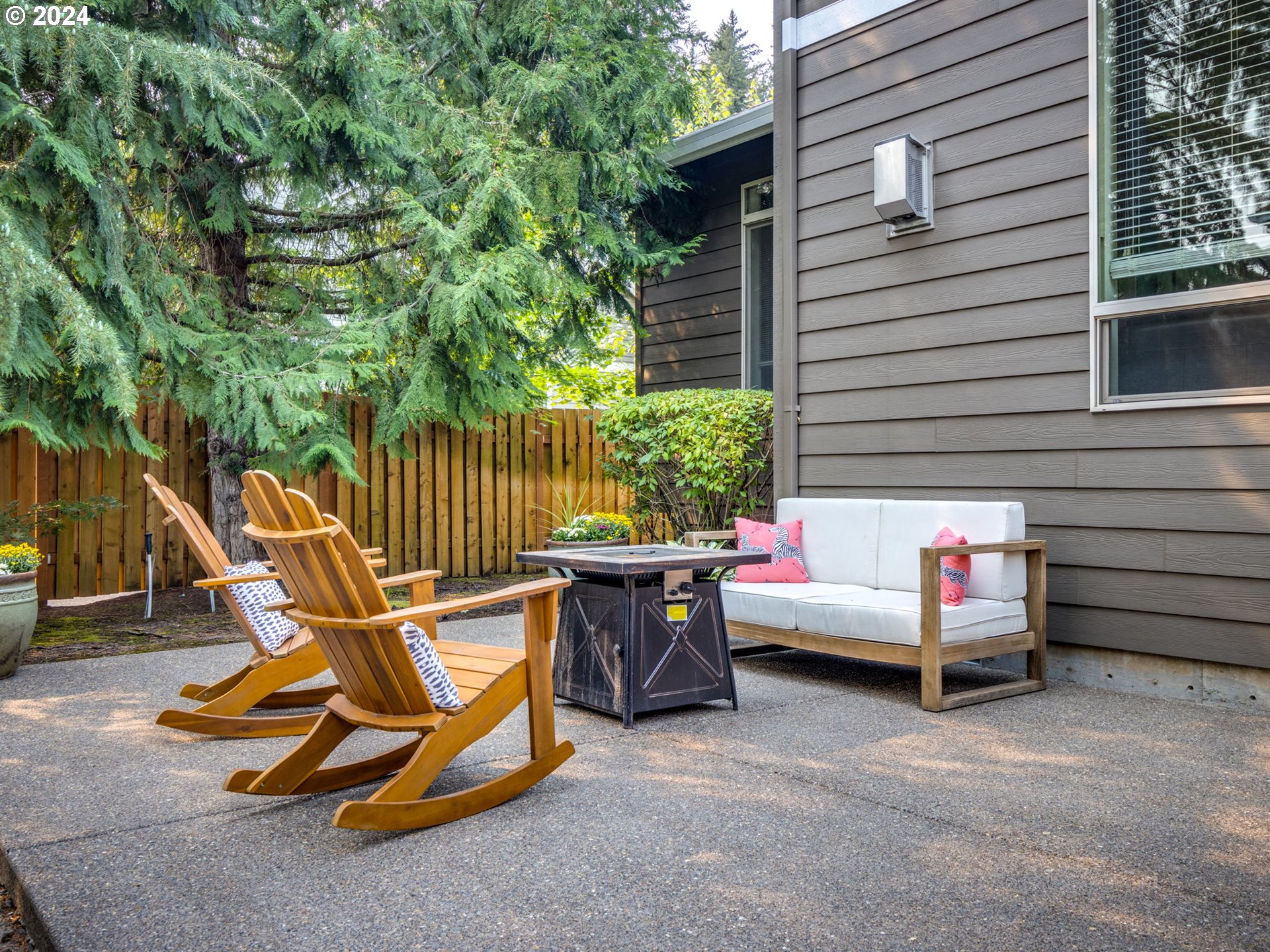 5316 Lower Drive Lake Oswego, OR 97035 - Photo 21 of 25 a view of a lounge chairs in the back yard of the house