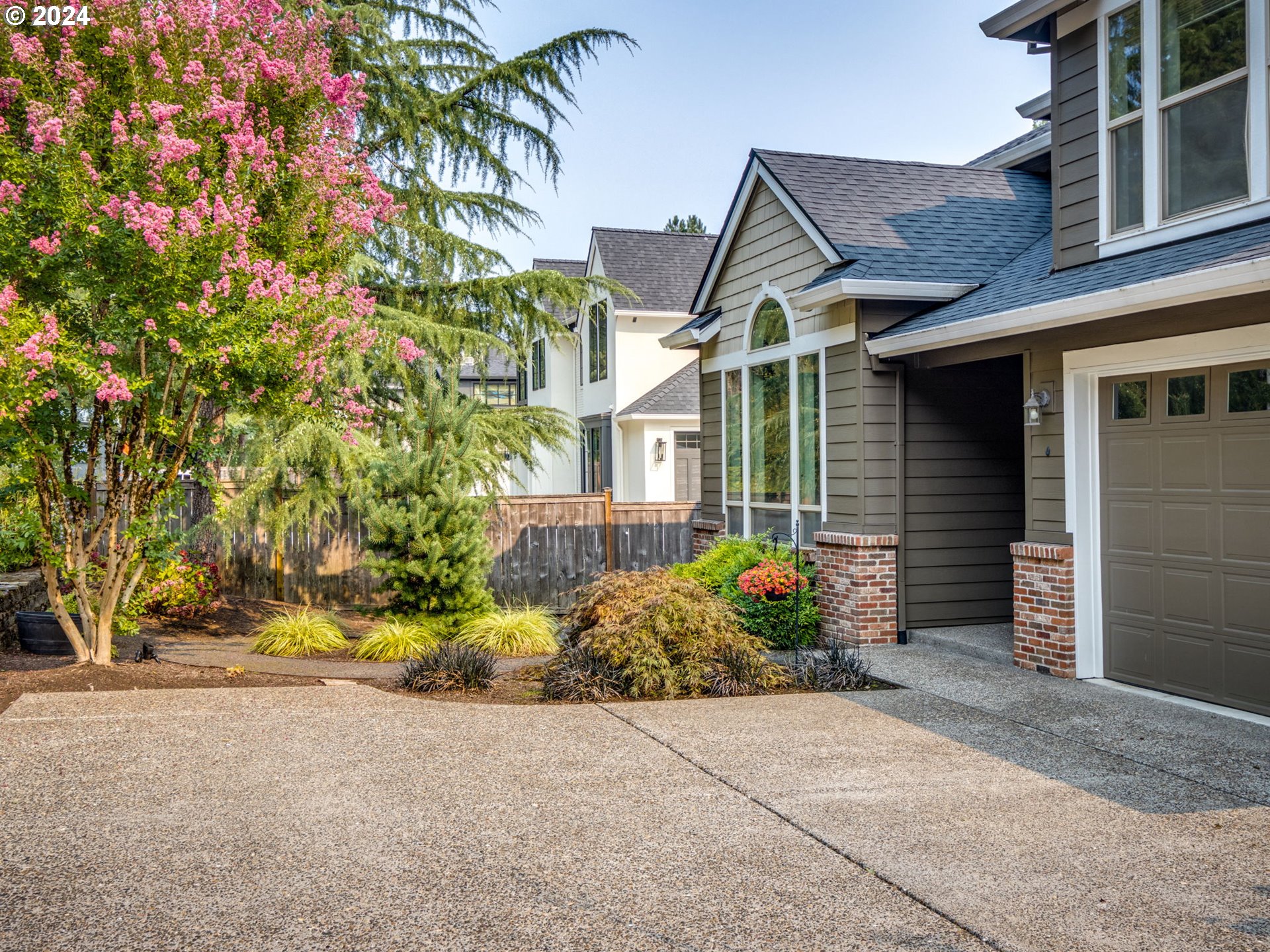 5316 Lower Drive Lake Oswego, OR 97035 - Photo 22 of 25 a front view of a house with a yard and potted plants